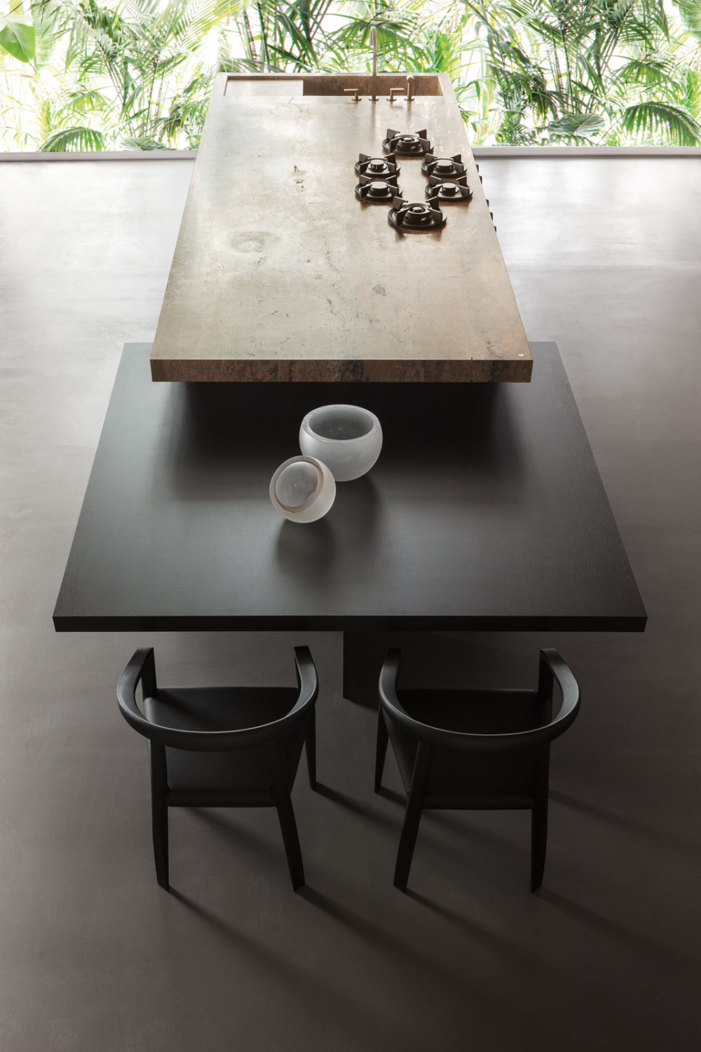 Ratio kitchen made by steel, sophisticated wood and marble and black countertop