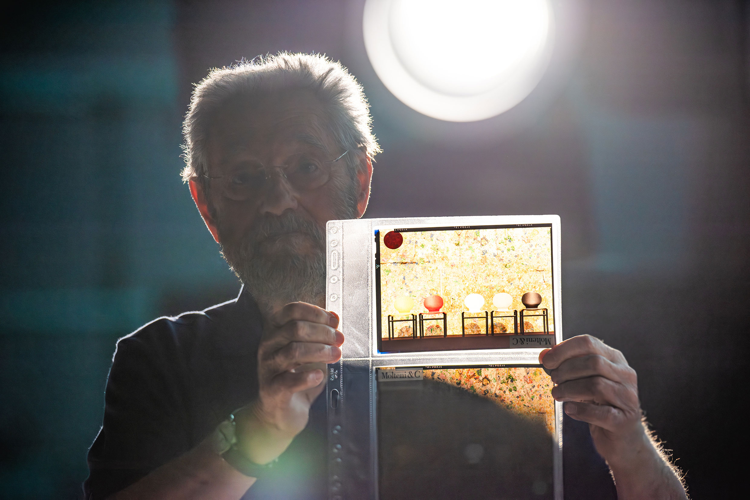 Tobia Scarpa presents an image of the Meo chairs (1981), design by him and Afra Scarpa. Ph. Jeff Burton, from Molteni Mondo by Rizzoli NY, 2024