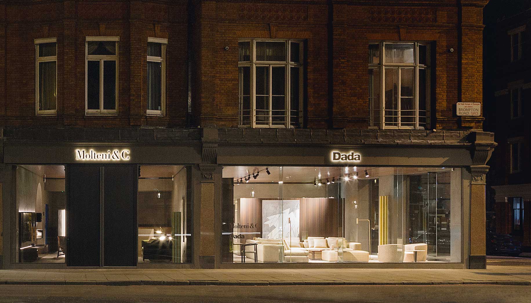English building in red bricks with furniture showroom
